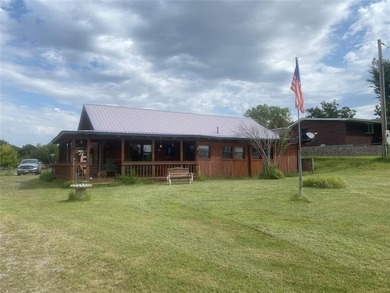 Log cabin ready to enjoy. Lake views and great location with - photo 1