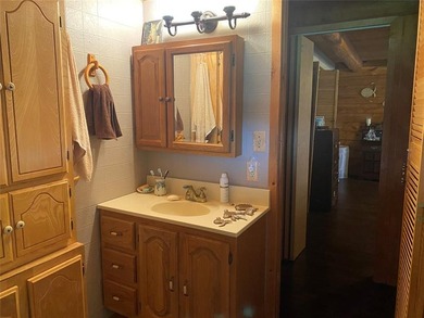 Log cabin ready to enjoy. Lake views and great location with - photo 8