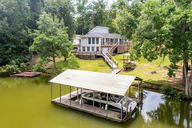 Experience the best of lake living with two homes on one - photo 1