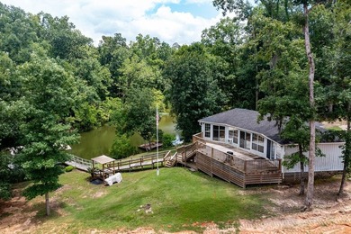 Experience the best of lake living with two homes on one - photo 2
