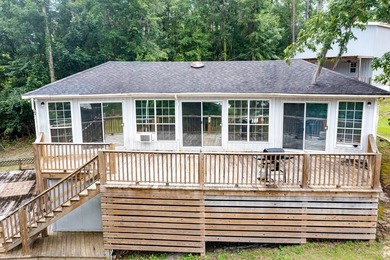 Experience the best of lake living with two homes on one - photo 4