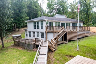 Experience the best of lake living with two homes on one - photo 5