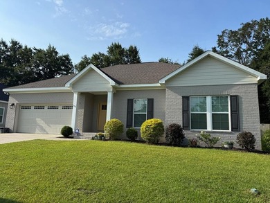Like-new brick home in Reflections on the Lake Subdivision - photo 1