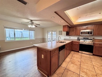 Located in the community of Wood Trail Village, this 3-bedroom - photo 9