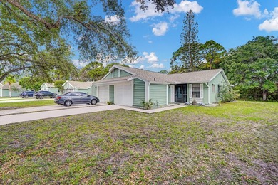 This charming 2 bedroom/2 bath end unit villa is a unique find - photo 2
