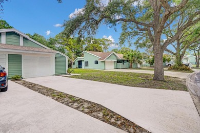 This charming 2 bedroom/2 bath end unit villa is a unique find - photo 3