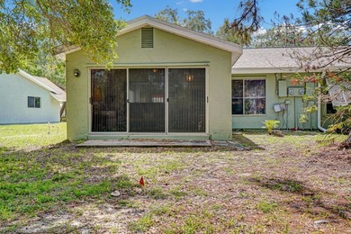 This charming 2 bedroom/2 bath end unit villa is a unique find - photo 5