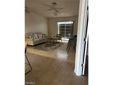 Adorable waterfront 2/2 + den. Den can be used as a 3rd bedroom - photo 1