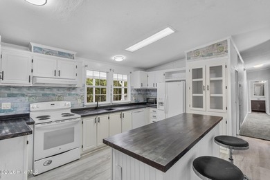 Welcome home to this 4-bedroom, 3-bath home with a versatile - photo 14