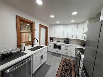 This tastefully updated two bedroom , two bath cabin is located - photo 15