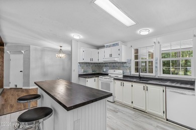Welcome home to this 4-bedroom, 3-bath home with a versatile - photo 16