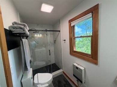 This tastefully updated two bedroom , two bath cabin is located - photo 25