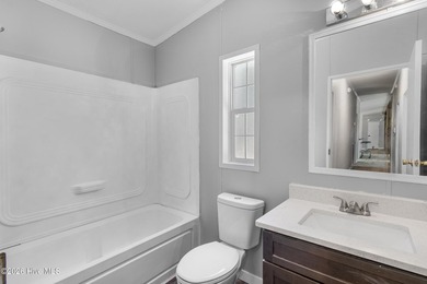 Welcome home to this 4-bedroom, 3-bath home with a versatile - photo 26