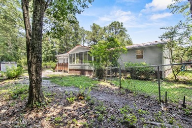 Welcome home to this 4-bedroom, 3-bath home with a versatile - photo 43