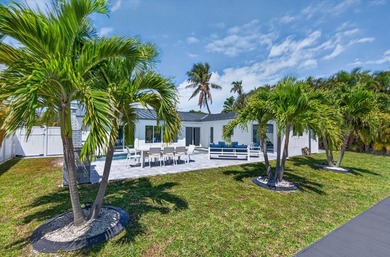 Experience waterfront living in this beautifully updated - photo 14