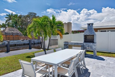 Experience waterfront living in this beautifully updated - photo 16