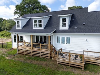 Welcome to luxury lakefront living in the highly sought-after - photo 6