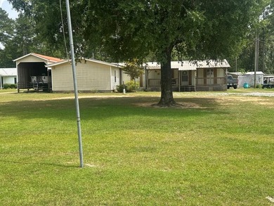 Come experience lakefront living on this beautiful, level lot - photo 1
