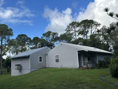 Lake Home For Sale in The Acreage, Florida