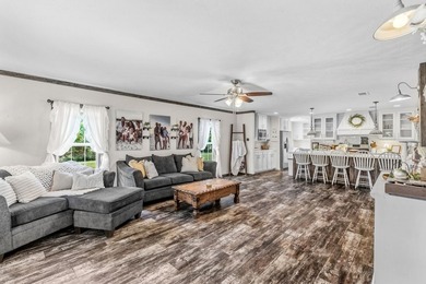 Charming 2020 manufactured farmhouse-style home on nearly an - photo 3