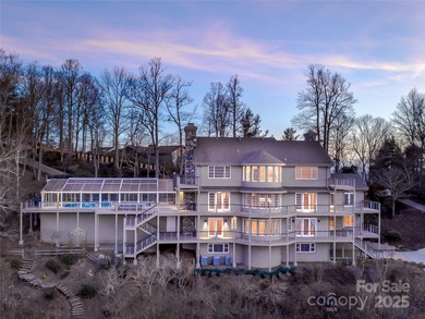 Commanding one of Asheville's most awe-inspiring mountain