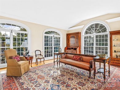 Commanding one of Asheville's most awe-inspiring mountain