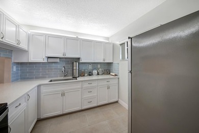 Beautifully updated 2-bedroom, 1-bathroom first-floor condo - photo 8
