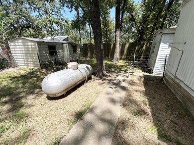 Just a walk to Cedar Creek Lake, this property sits on a - photo 13