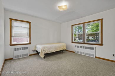 Extremely well-maintained 2-family Cape in the heart of Dongan - photo 13