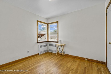 Extremely well-maintained 2-family Cape in the heart of Dongan - photo 15