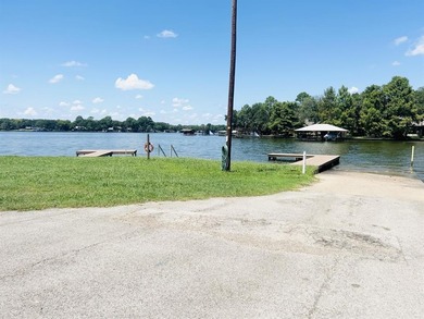 Just a walk to Cedar Creek Lake, this property sits on a - photo 16