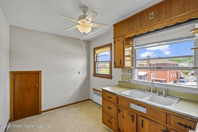Extremely well-maintained 2-family Cape in the heart of Dongan - photo 25