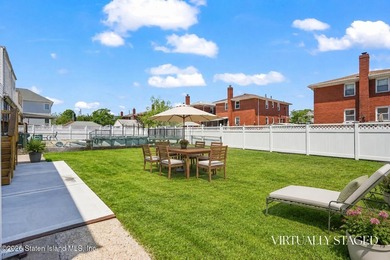 Extremely well-maintained 2-family Cape in the heart of Dongan - photo 32