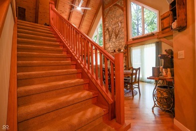Custom red oak timber-frame home with Lake Monroe views, located - photo 18