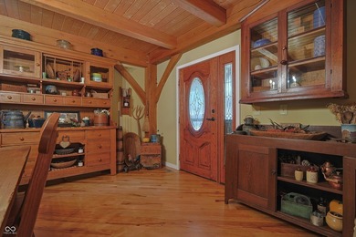 Custom red oak timber-frame home with Lake Monroe views, located - photo 19