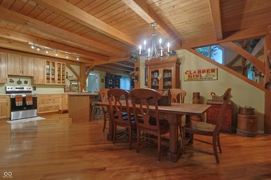 Custom red oak timber-frame home with Lake Monroe views, located - photo 20