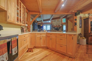 Custom red oak timber-frame home with Lake Monroe views, located - photo 25