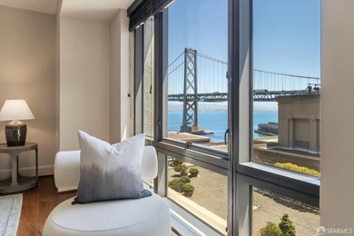 Residence 1001 at historic Hills Plaza is a warm, light-filled - photo 1