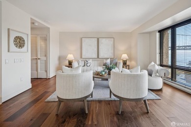 Residence 1001 at historic Hills Plaza is a warm, light-filled - photo 4