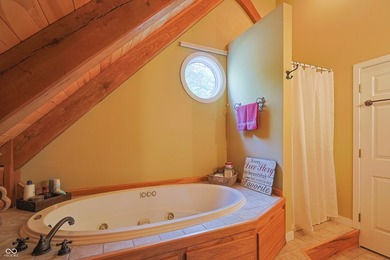 Custom red oak timber-frame home with Lake Monroe views, located - photo 41