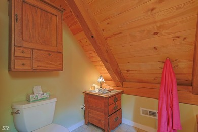 Custom red oak timber-frame home with Lake Monroe views, located - photo 42