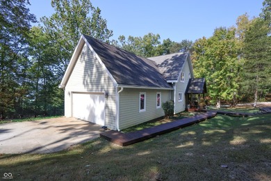 Custom red oak timber-frame home with Lake Monroe views, located - photo 56