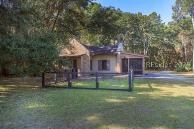 Surrounded by majestic Live Oaks and overlooking the 12th - photo 18