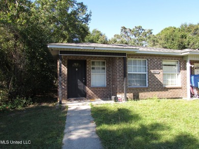 Great investment opportunity in this 3/2 brick duplex. Both - photo 2