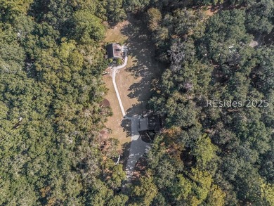 Surrounded by majestic Live Oaks and overlooking the 12th - photo 26