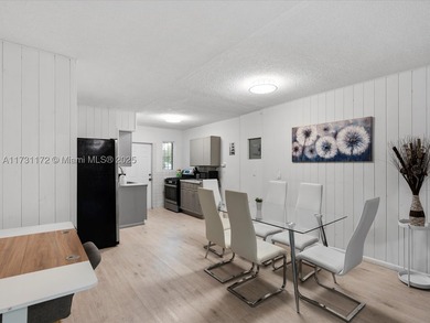 Income-producing 4-unit STR multifamily with prime redevelopment - photo 7