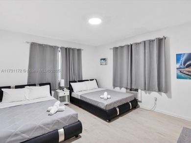 Income-producing 4-unit STR multifamily with prime redevelopment - photo 10