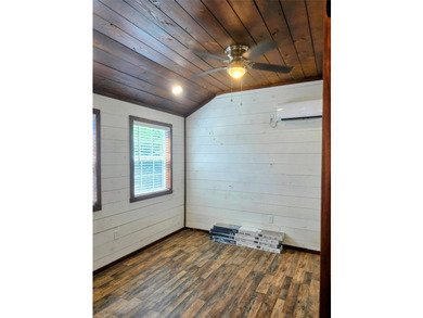 This charming tiny home at Lake Holbrook in Mineola, TX, blends - photo 6