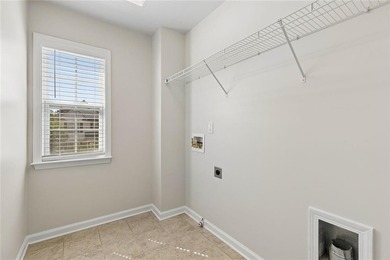 Two-story home featuring an open, light-filled floor plan with - photo 14