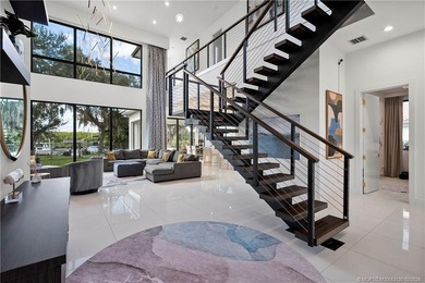 Experience modern waterfront luxury in this stunning - photo 11